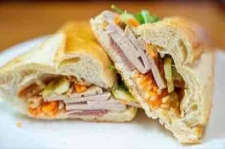 Pork pâté and sausage banh mi with pickled vegetables